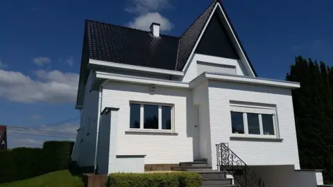 Geschilderde gevel van een woning in Lubbeek