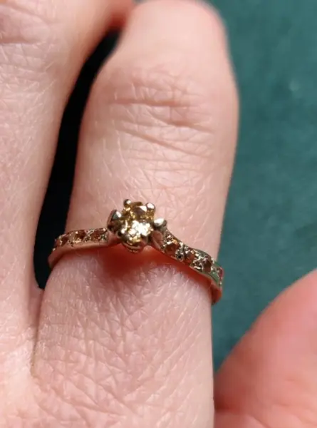verlovingsring ring 18k wit goud diamant saffier oranje Leuven Vlaams-Brabant