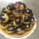 Profitéroles : croûte sablée, petits choux garnis (crème pâtissière, chantilly ou diplomate) (1.50€/chou)